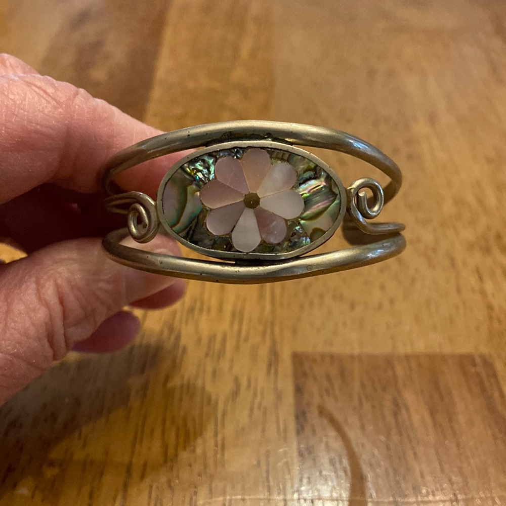 Silver mother of pearl cuff bracelet .